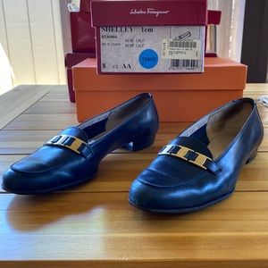 Salvatore Ferragamo navy blue walking shoes. Good condition.